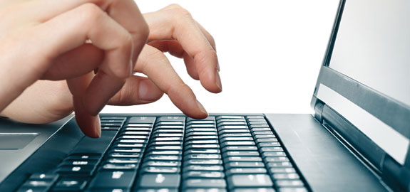 67751 company Hands above computer keyboard pan 14505